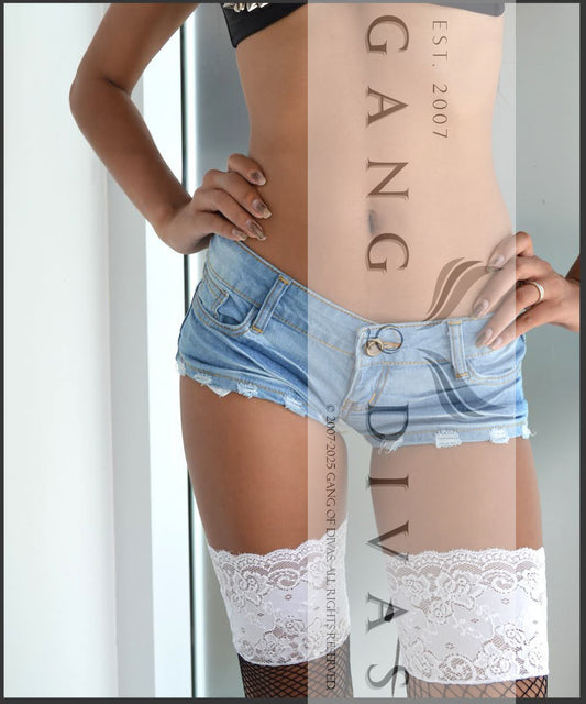 Tyla-inspired low-rise Micro light Blue denim shorts with creased effect.