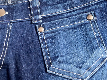 Low Rise Blue Micro Jean Shorts | faded wash denim with 4 packets